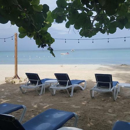 Firefly Beach Cottages Negril Bagian luar foto