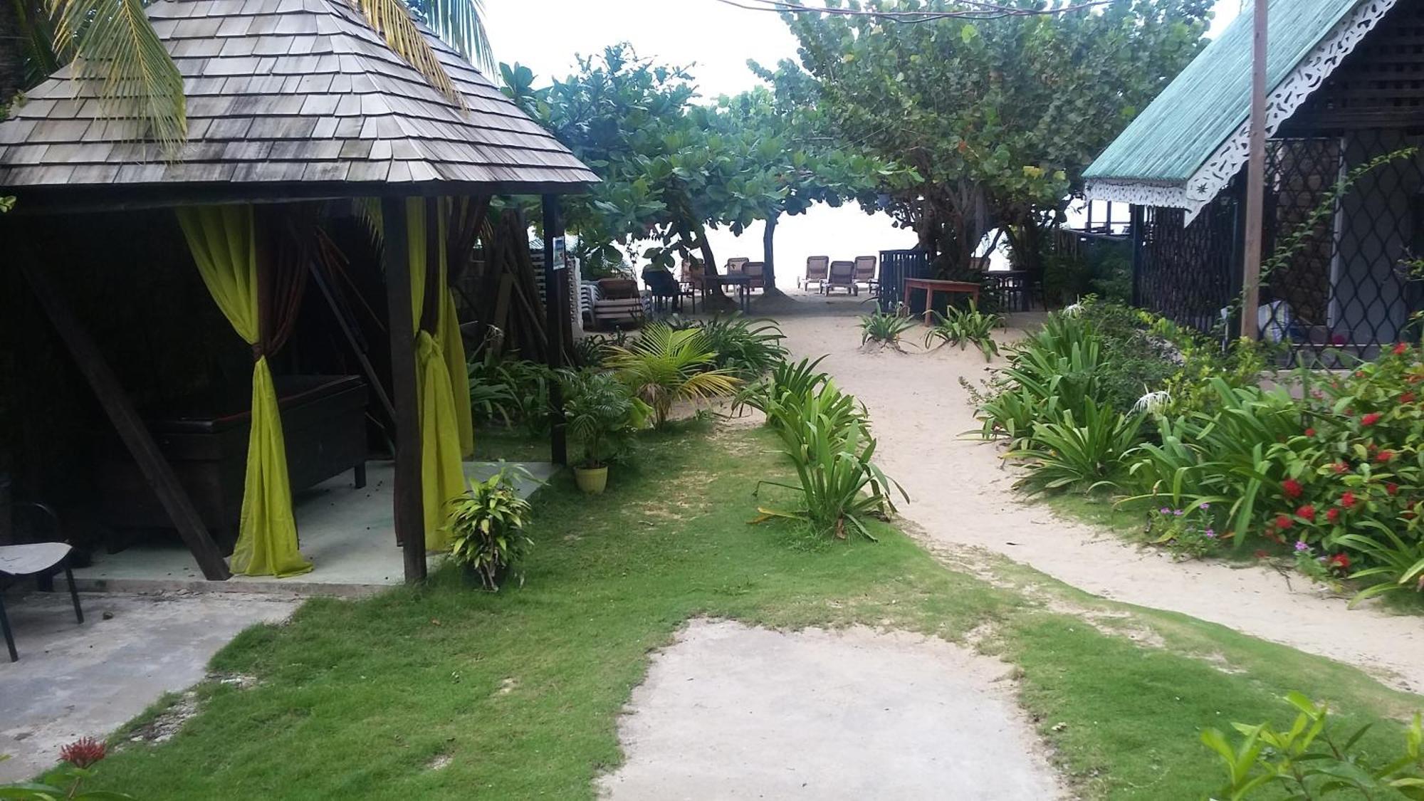 Firefly Beach Cottages Negril Bagian luar foto