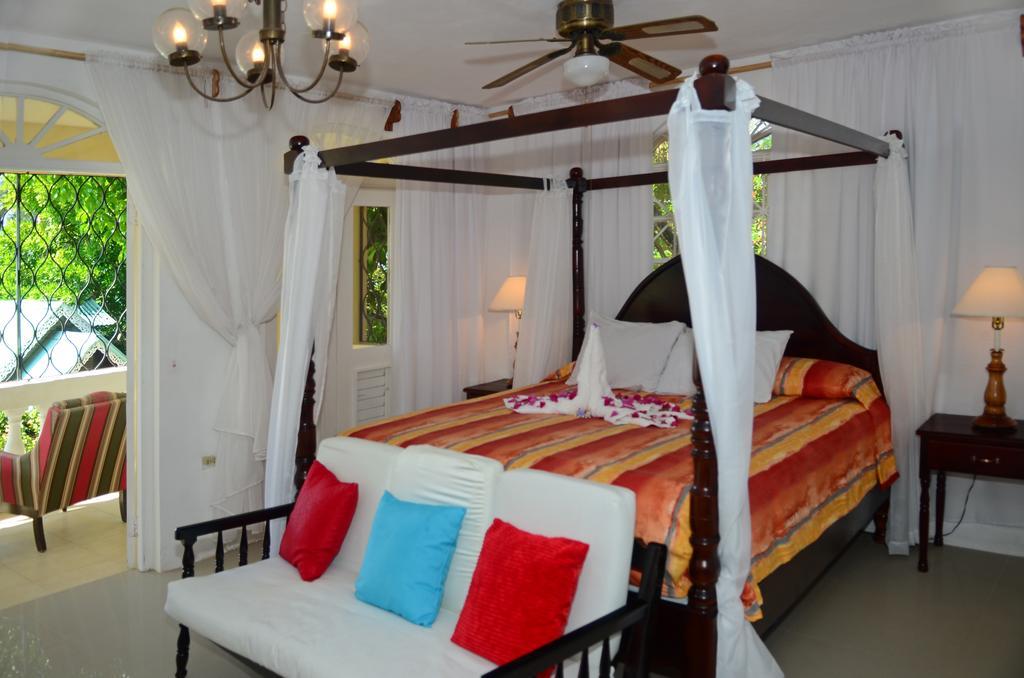 Firefly Beach Cottages Negril Bagian luar foto