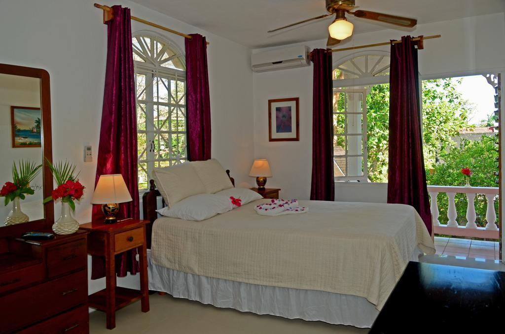 Firefly Beach Cottages Negril Bagian luar foto