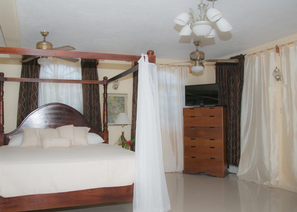 Firefly Beach Cottages Negril Bagian luar foto