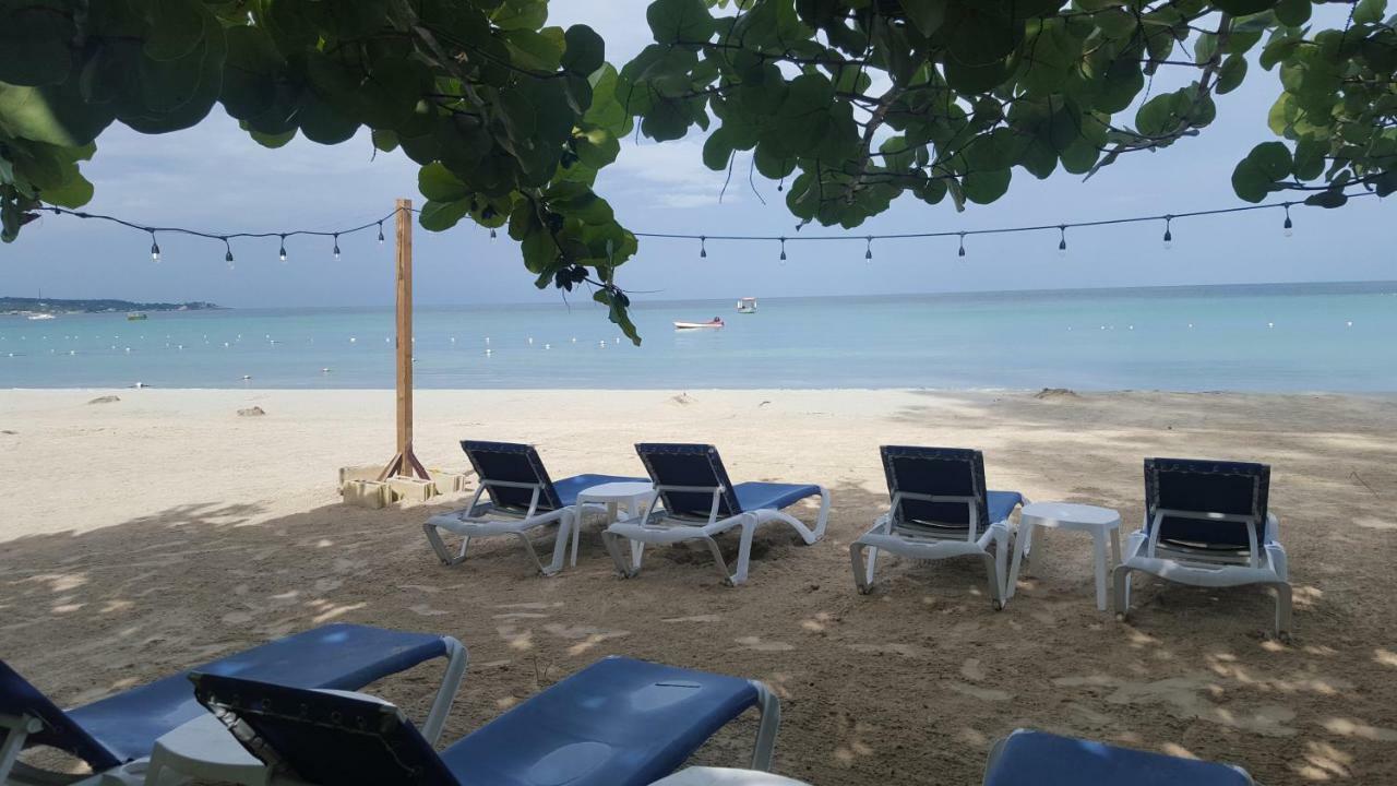 Firefly Beach Cottages Negril Bagian luar foto